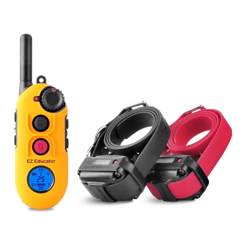 Yellow electronic dog training device with black and red collars on a white background