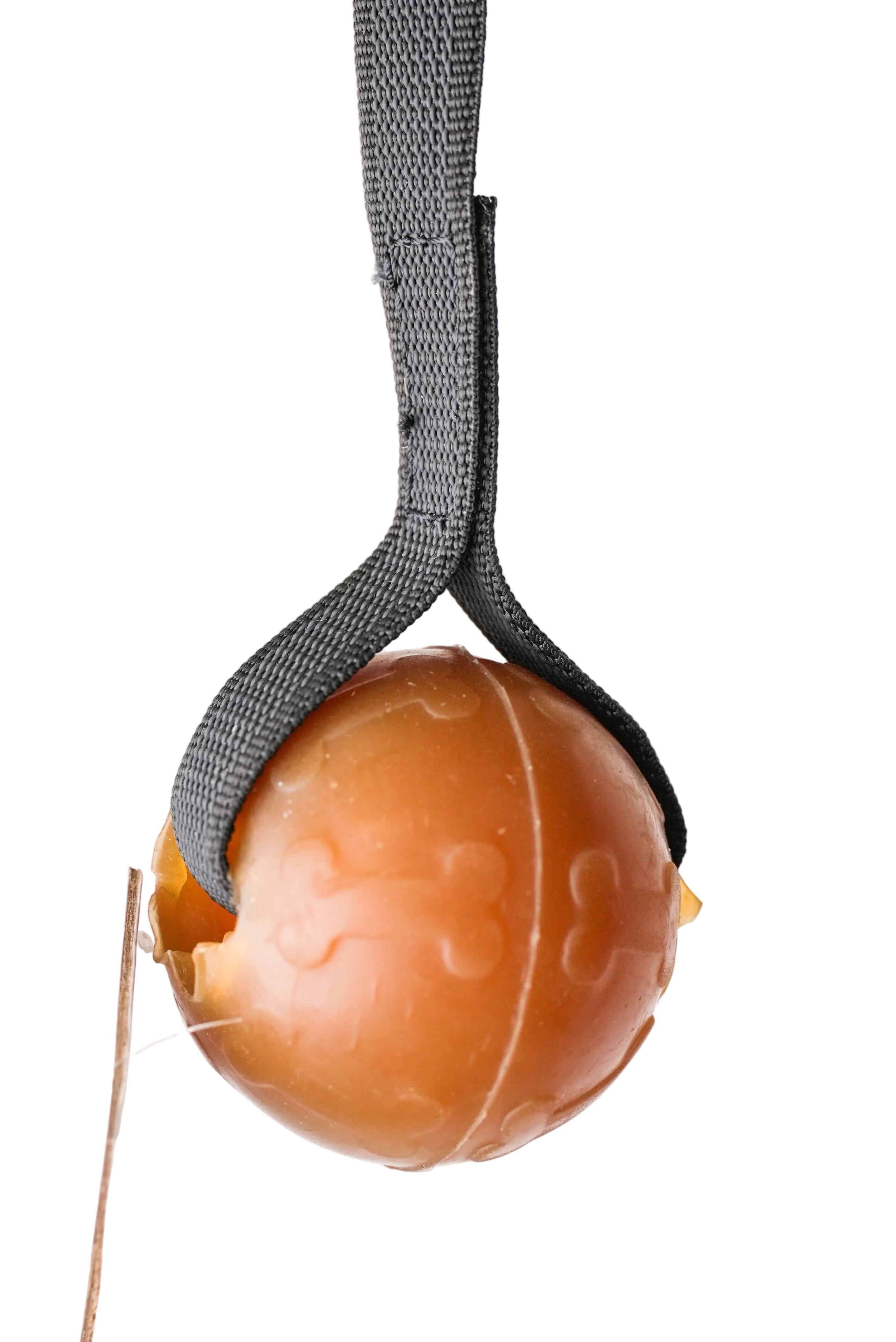 Schweikert Tschukaball Organic Natural Rubber Ball on a String angle